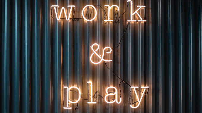 Neon work and play sign